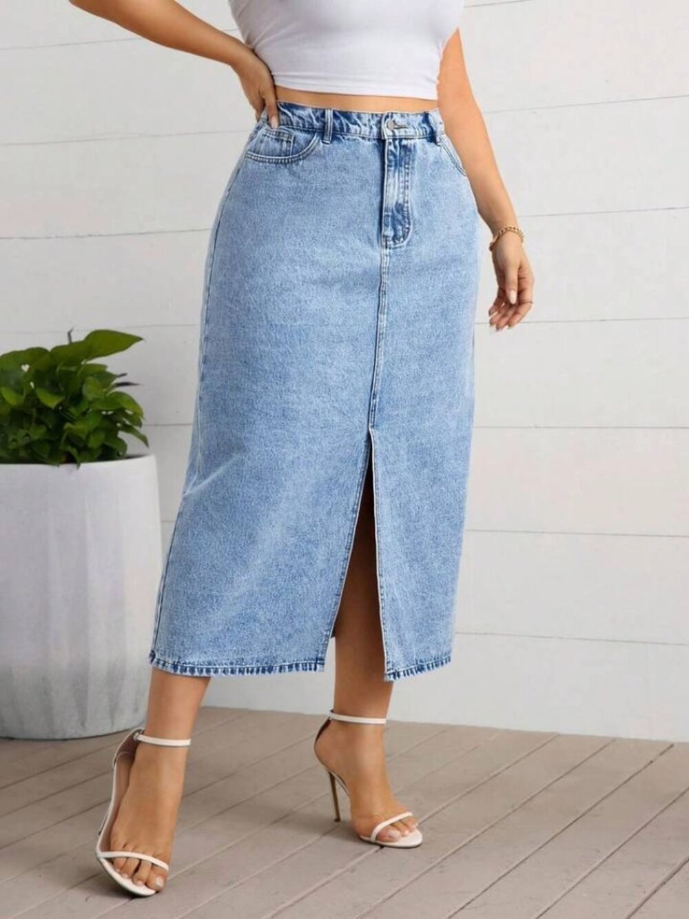 Mango denim maxi skirt features a light acid-wash finish and a front slit